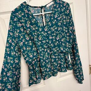 Green top with pink floral pattern